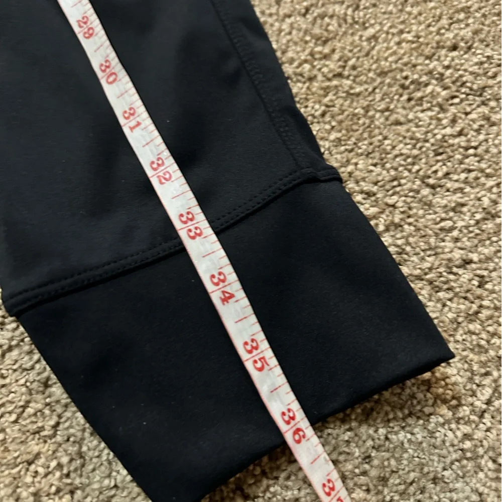 Black yoga leggings cuffed with pockets size large